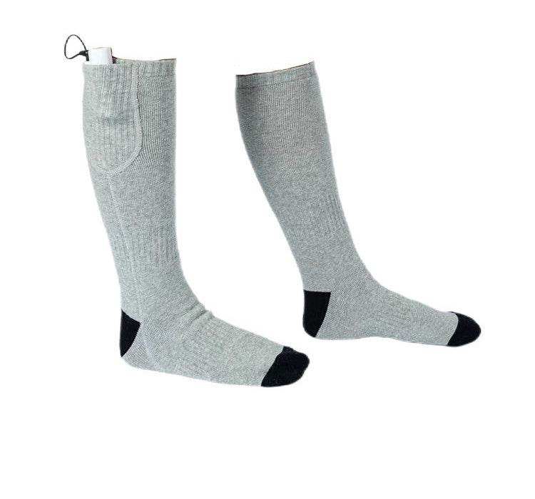 Gray battery-powered heated socks with black toe and heel, featuring a 4000 mAh rechargeable battery and washable, comfortable fabric for winter warmth.